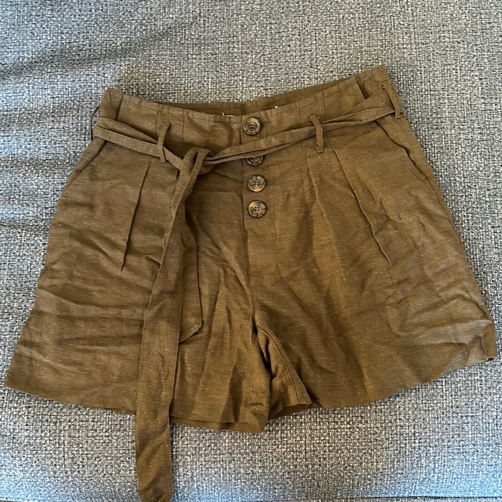 Dark olive shorts. Tie belt